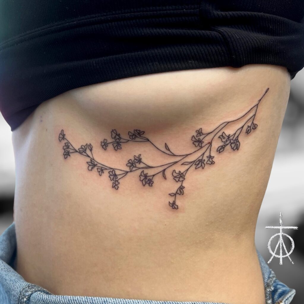 Fine Line Tattoo, Floral Line , Continuous Line Tattoo on Ribs
