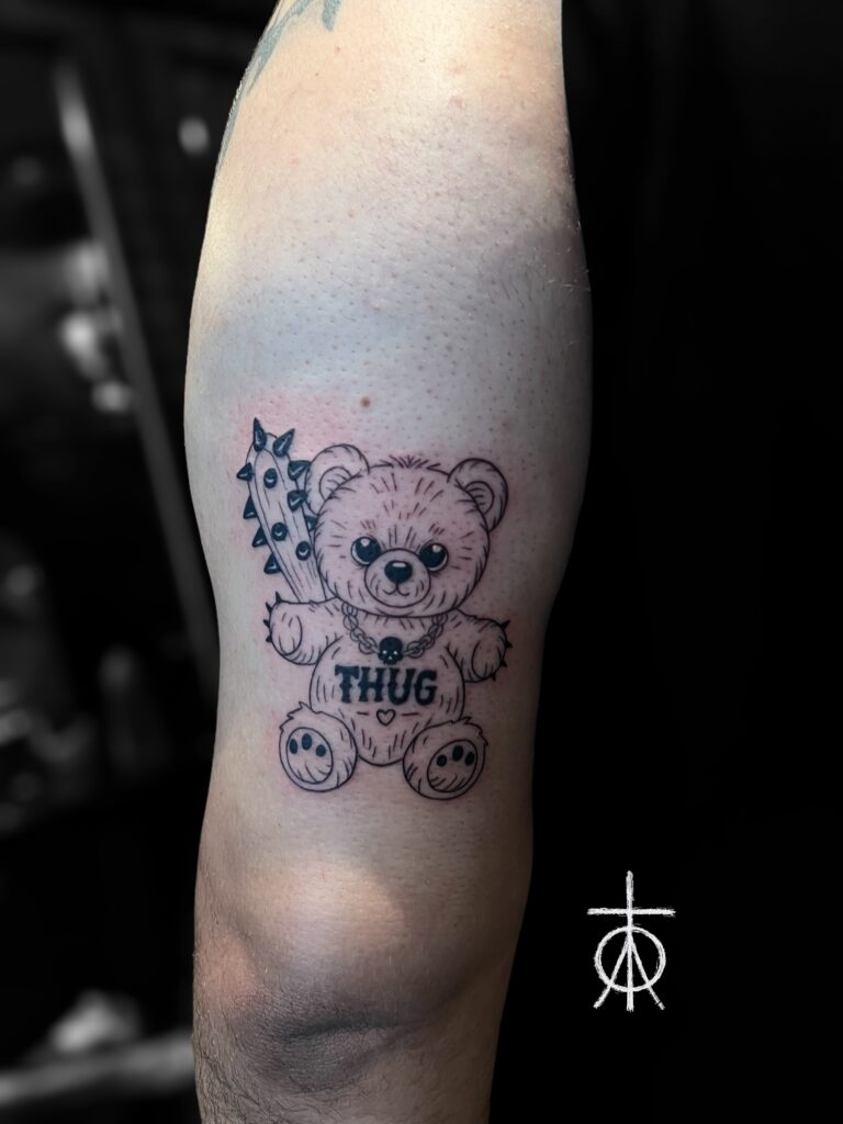 THUG Teddy Tattoo, Cool Tattoos , The Best Line Work Tattoo, The Best Blackwork Tattoo Artist Claudia Fedorovici