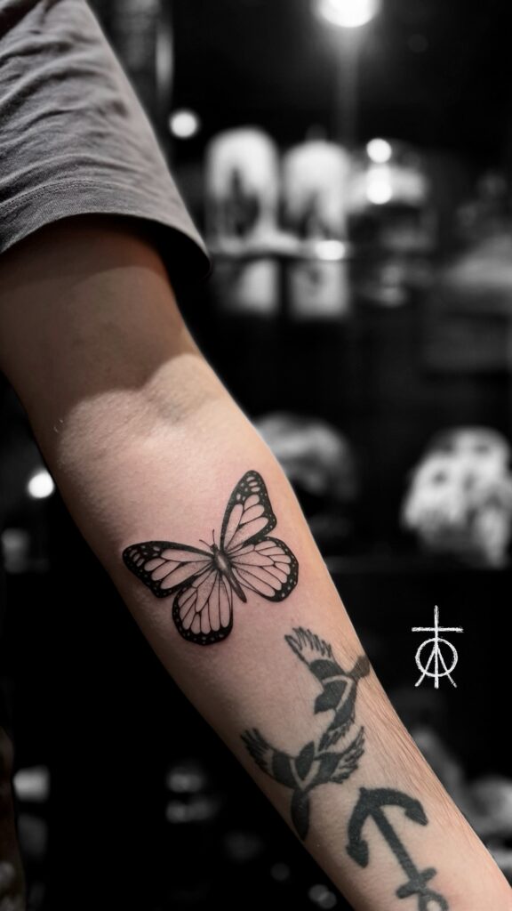 Blackwork Butterfly Tattoo, Fine Line Tattoo, Tattoo idea for guys by the best Fine Line Tattoo Artist in Amsterdam